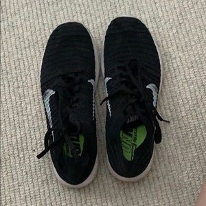 Black Nike Free flyKnit running shoes